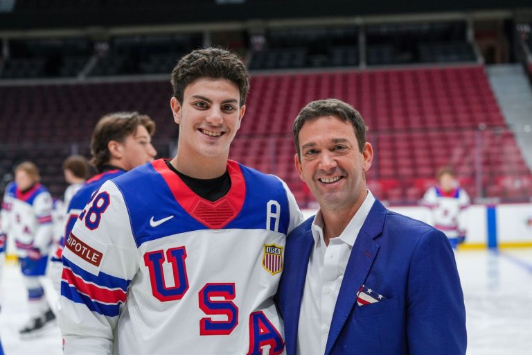 Doctor with a Young Ice Hockey Athlete